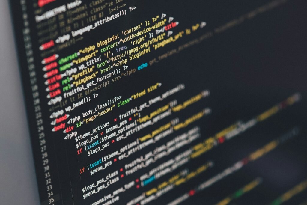 Close up of website source code on a dark screen